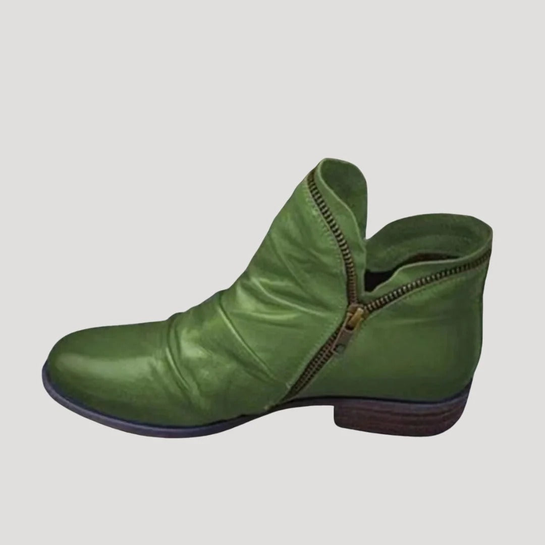 Dam ankelboots i konstläder med dragkedja