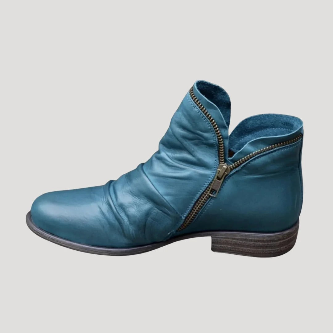 Dam ankelboots i konstläder med dragkedja