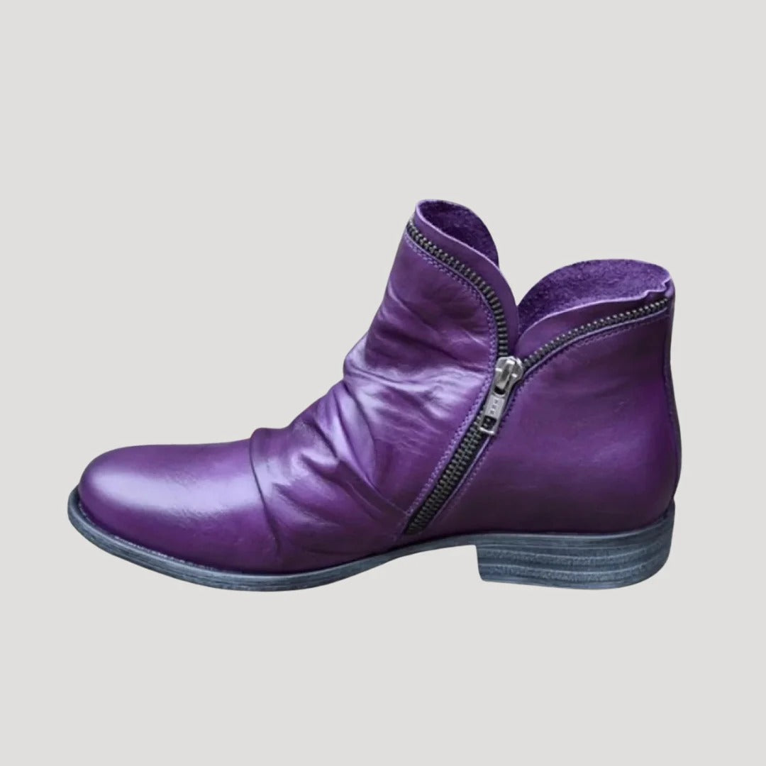 Dam ankelboots i konstläder med dragkedja