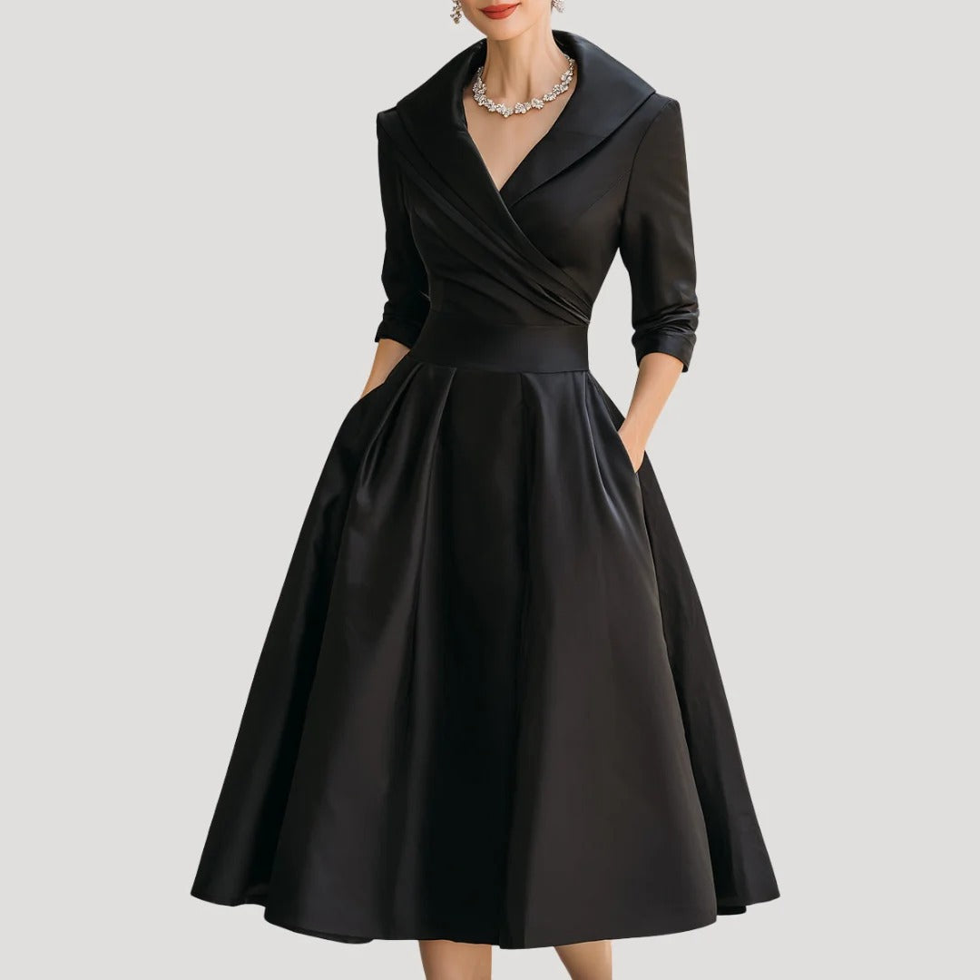 Dam elegant omlottklänning i midilängd